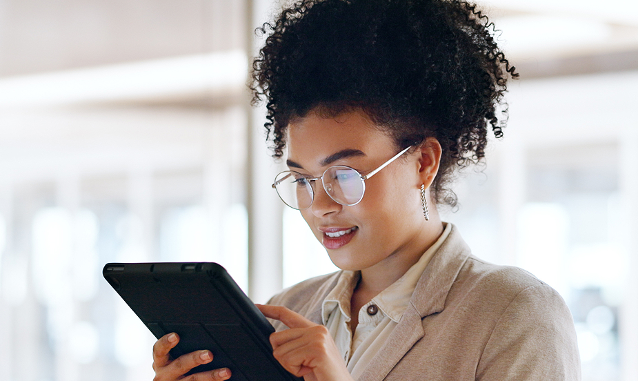 woman reading on a tablet