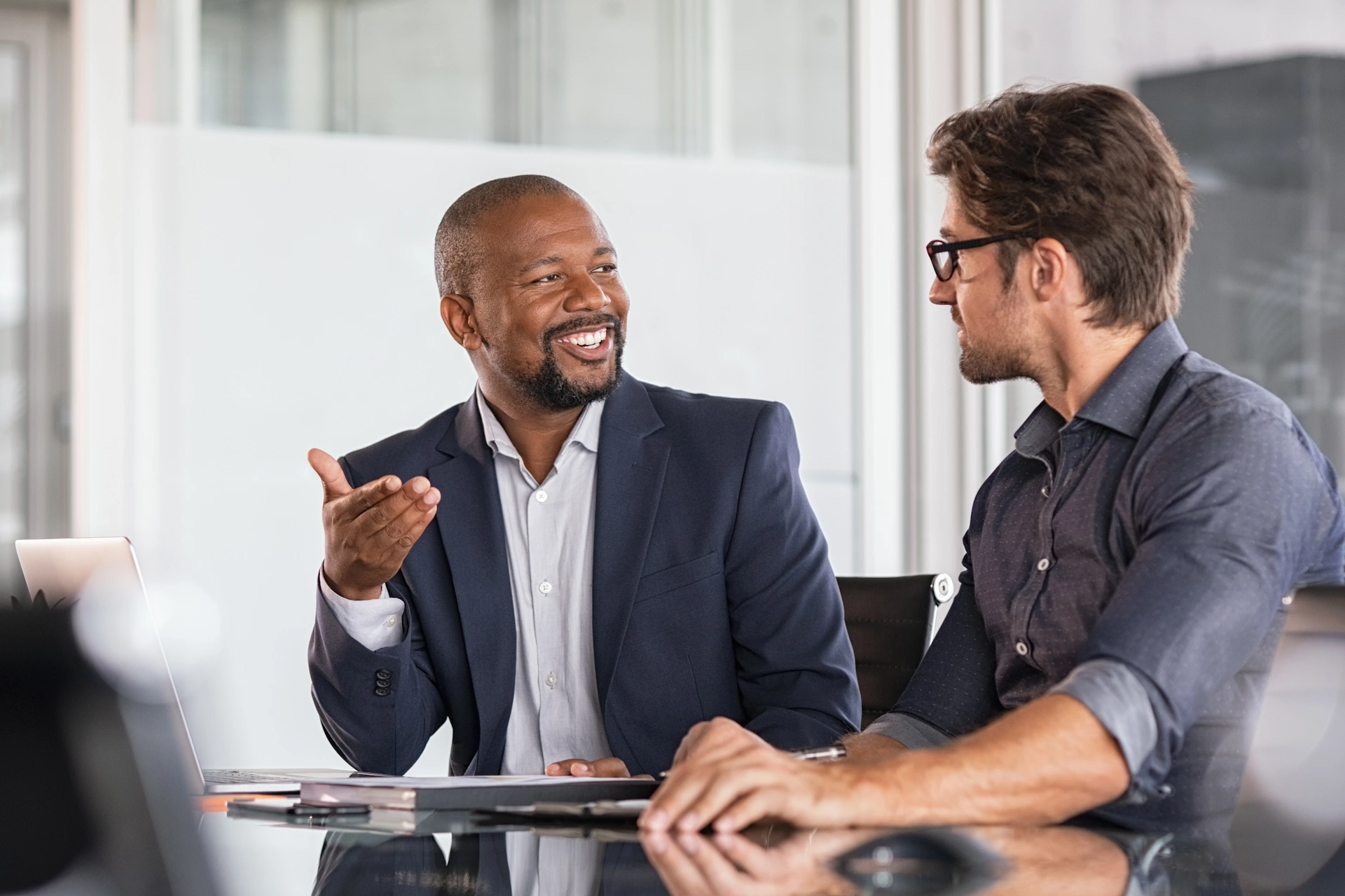 team members speaking to one another